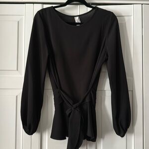 Women’s black blouse with tie at the waist size large.
